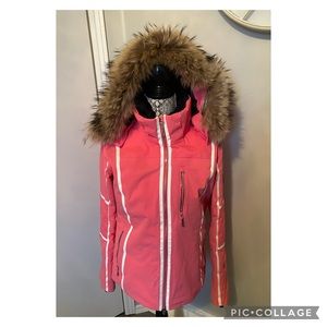 Ladies pink Descent ski jacket with coyote fur hood trim